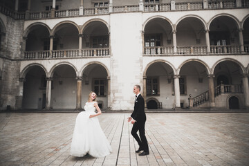 Caucasian happy romantic young couple celebrating their marriage. Outdoor