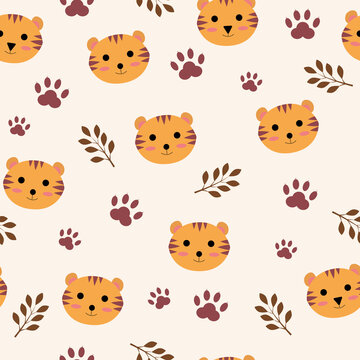 Seamless pattern with cute little tiger and footprints