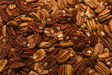 Tasty pecan-nut background. Top view.