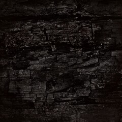 black rugged background, carbon texture