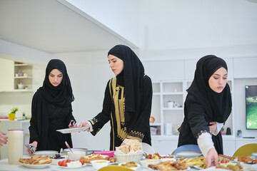 Young muslim women preparing food for iftar during Ramadan