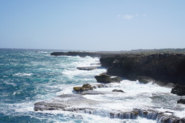 waves crashing on rocks