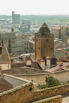 Alfiler tower, a 14th Century Gothic belfry adorned with glazed roof tiles and favourite nesting place for storks.