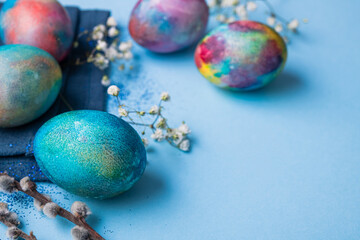 Obraz na płótnie Canvas Mystical coloring eggs with spring flowers