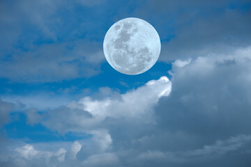 Naklejka na ściany i meble Full moon with clouds on the sky.