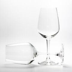 Empty wine glass on white background.