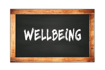Fototapeta premium WELLBEING text written on wooden frame school blackboard.