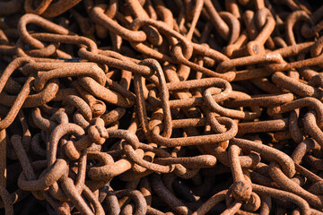 .Old rusty chains in a fishing port, selective focus.