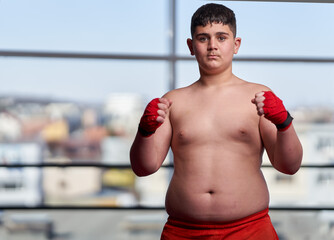 Overweight confident boxer