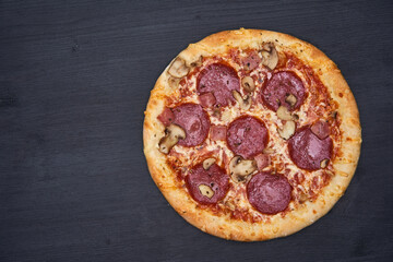 Delicious pizza on wooden board