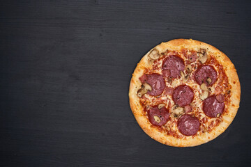 Delicious pizza on wooden board