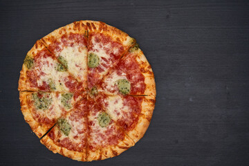 Delicious pizza on wooden board
