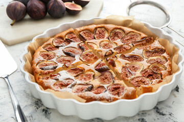 Delicious fig pie on grunge background