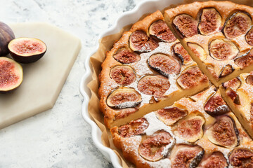 Delicious fig pie on grunge background