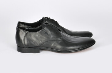 Elegant footwear personal accessory for men studio shoot