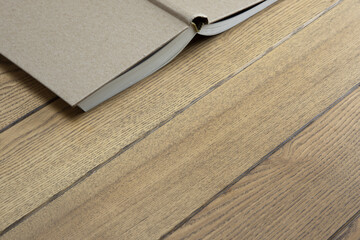 open book upside down on a wooden table background image, no people