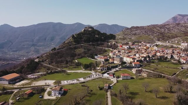 Aerial panoramic landscape view of Pietraroja, a village in Italy, on top of a hill, in the Apennines