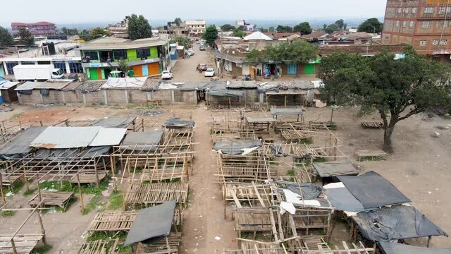 City scape view of the drone descending down from Air. Poor structure of woods down the drone flying in Africa of Kenya Loitokitok march  2021.