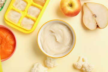 Composition with healthy baby food on color background