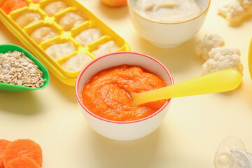 Composition with healthy baby food on color background, closeup