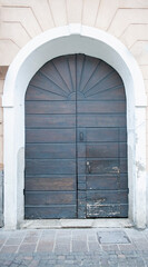 Naklejka premium Front entrance door leading to a house in Italy