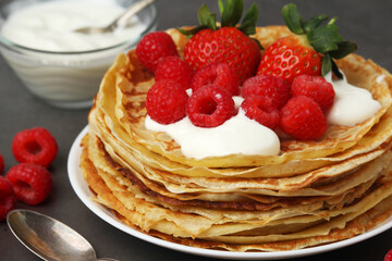 Russian cuisine national dish bliny with fresh berries
