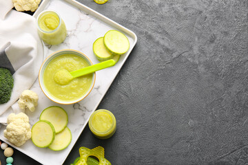 Composition with healthy baby food on dark background