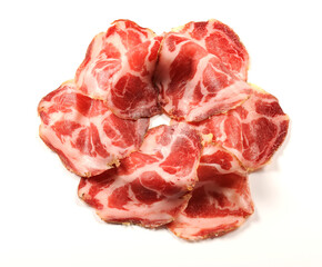 Loin called coppa di lonza in the shape of a rose isolated on white background