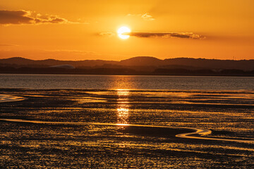 夕日と干潟