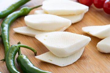 Close-up cheese on wooden background. Local name lavaş peyniri