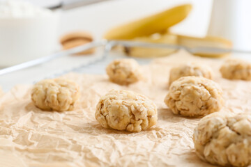 Uncooked banana cookies on table, closeup