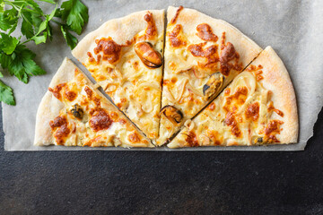 seafood pizza mussels squid shrimps prawn portion on the table meal snack outdoor top view copy space for text pescetarian food background