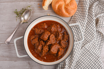 Delicious Viennese beef goulash with Viennese bun