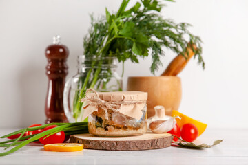 Homemade canned fish from mackerel in oil. Glass jars with canned fish