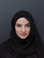 Naklejka premium Portrait of young muslim woman wearing hijab