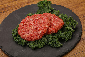 Raw beef burger cutlet for cooking
