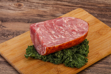 Beef ham piece over board