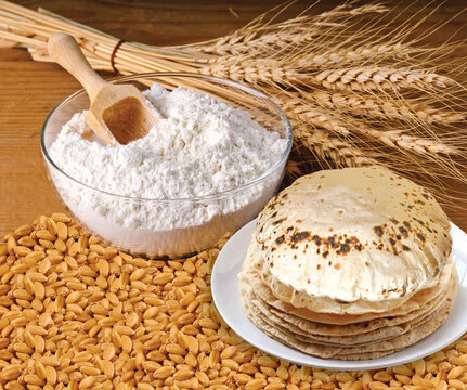 Rustic shot of a plate of chapati surrounded by ingredients