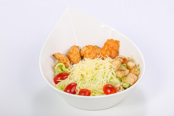 Caesar salad with chicken and parmesan