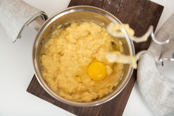 Dough preparation process. Dough ingredients with egg. Top view