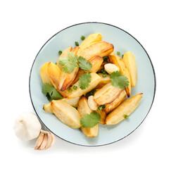 Plate of tasty baked potato with garlic on white background
