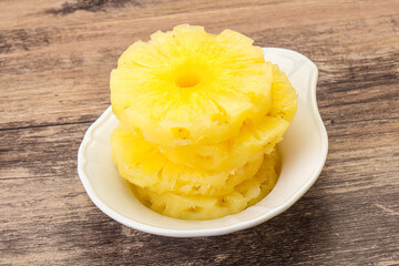 Sweet pineapple rings in the bowl