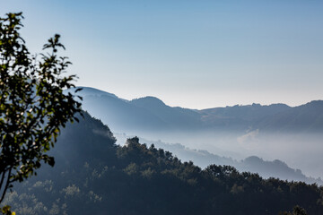 Misty foggy mountain landscape, Western Serbia
Clear blue cloudless sky and layers of hills. Cold moody sentiment