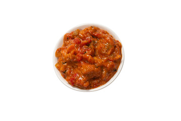 Vegetable stew in a bowl isolated on white background.