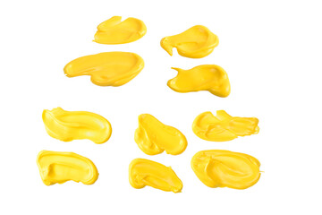 Yellow sauce splashes isolated on white background.