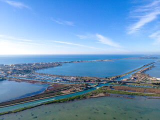 Aerial view of the coastline near Palavas les Flots showing the canals and lagoons in between to S&egrave;te	
