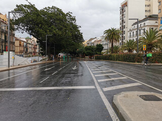 Málaga, Spain - February 21, 2021: View of the streets and buildings of Soho in Málaga ia rainy...