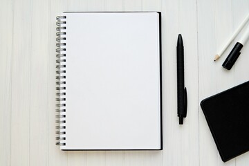 Blank spiral notebook planner mockup for text or design presentation, black and white office supplies, monochrome office desk, blogger work space with diary.