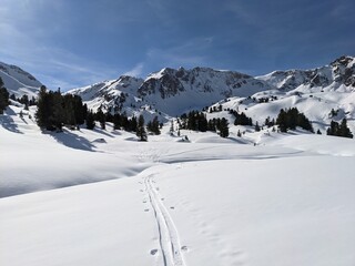 Beautiful ski tour in the Glarus region with a breathtaking view of the snow-covered mountains. Skimo, mountaineering