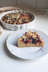 Freshly baked homemade summer berry cake on white background. Sweet food.